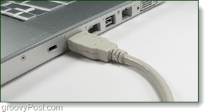 plug usb cord from phone to computer port