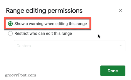 Select Show a warning when editing this range