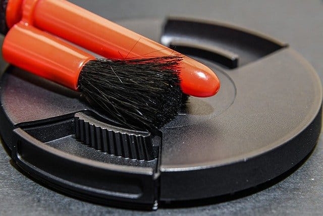 Camera lens cleaning brush